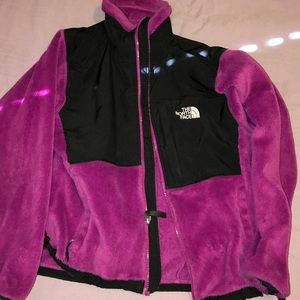 Woman’s purple north face jacket